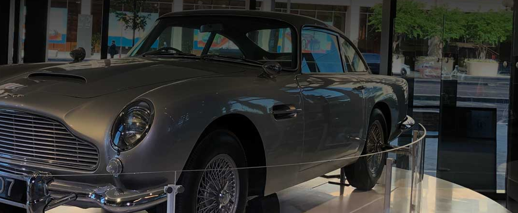 Old exotic sports car inside building on display