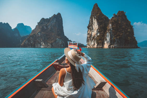 Person in a boat traveling on the ocean